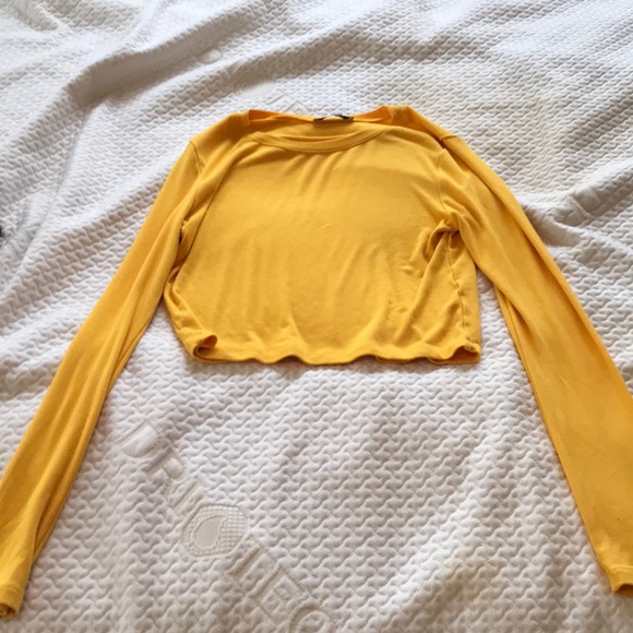 bright yellow long sleeve top